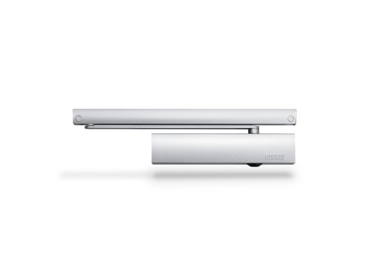 Product shot (72638) - Overhead door closer with guide rail for barrier-free single leaf doors up to 1250 mm leaf width with opening assistance, and integrated back check, which decelerates quickly opened doors.