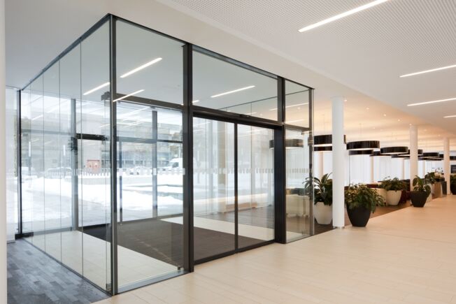 Paravent avec automatisme de portes coulissantes automatique Slimdrive SL NT Système de porte coulissante linéaire automatique avec une faible hauteur totale et une ligne de conception claire