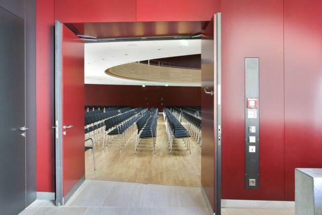 Door closer Boxer ISM and FTÖ 331 at the Ludwigsburg Kreissparkasse (form of bank) Integrated door closer system for double leaf doors with closing sequence control, electric hold-open device and integrated back check that slows down strongly opened doors.