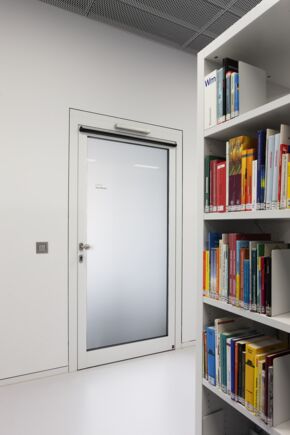 Swing door drive - Slimdrive EMD-F, City Library at the Mailänder Platz An electromechanical swing door drive for single leaf fire and smoke protection doors
