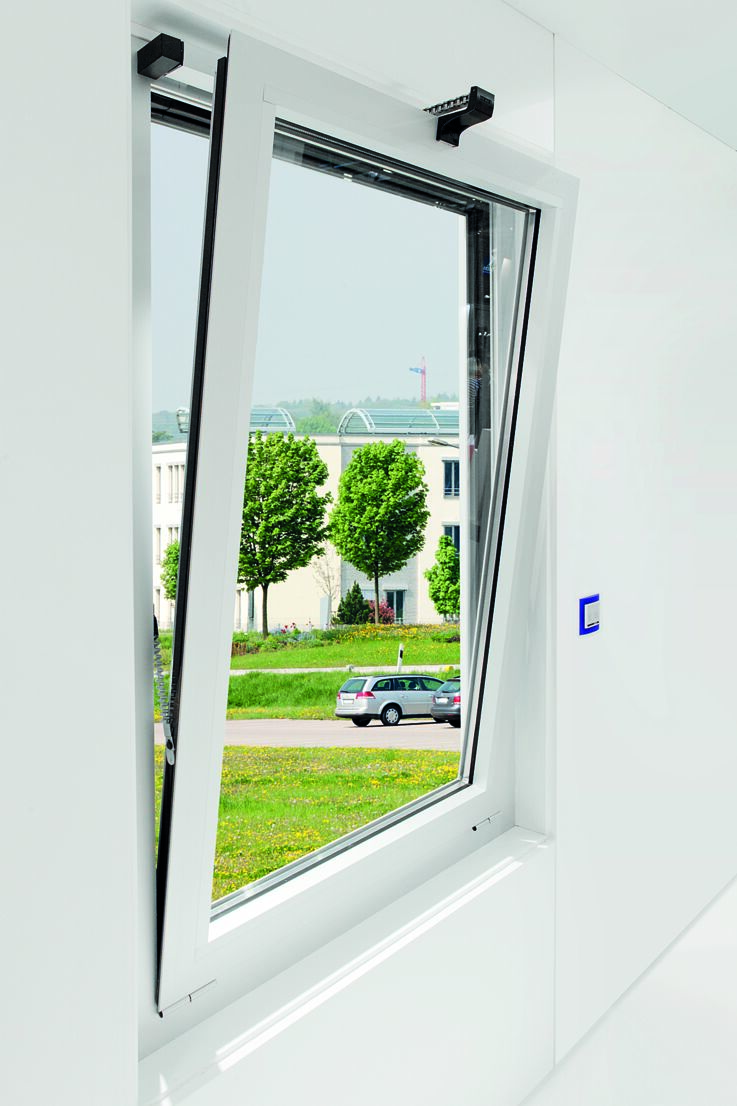 GEZE Powerchain chain drive, with safety scissor stay in a residential building