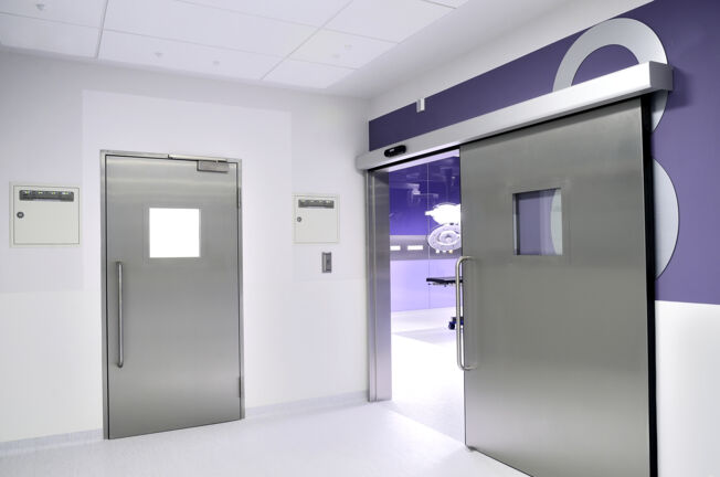 Hygienic Doors at Children's Memorial Health Institute Operating room doors in the corridor of the Children's memorial Health Institute in Warsaw, Poland. Hygienic doors, doorway, window and safety technology for health care, for hospitals.
