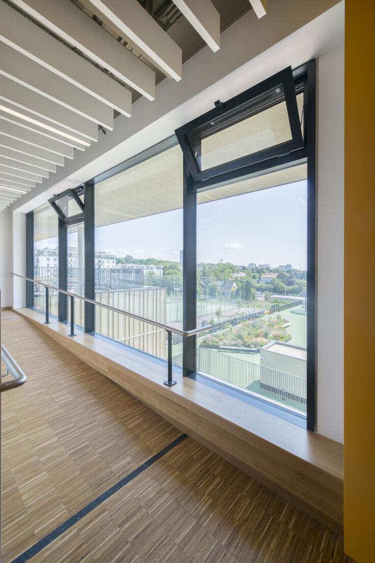 Detailed view of a tilted window in the school centre of the Grundäckergasse secondary school in Vienna