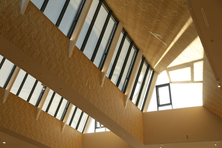 View of the ceiling inside the shopping centre with large windows